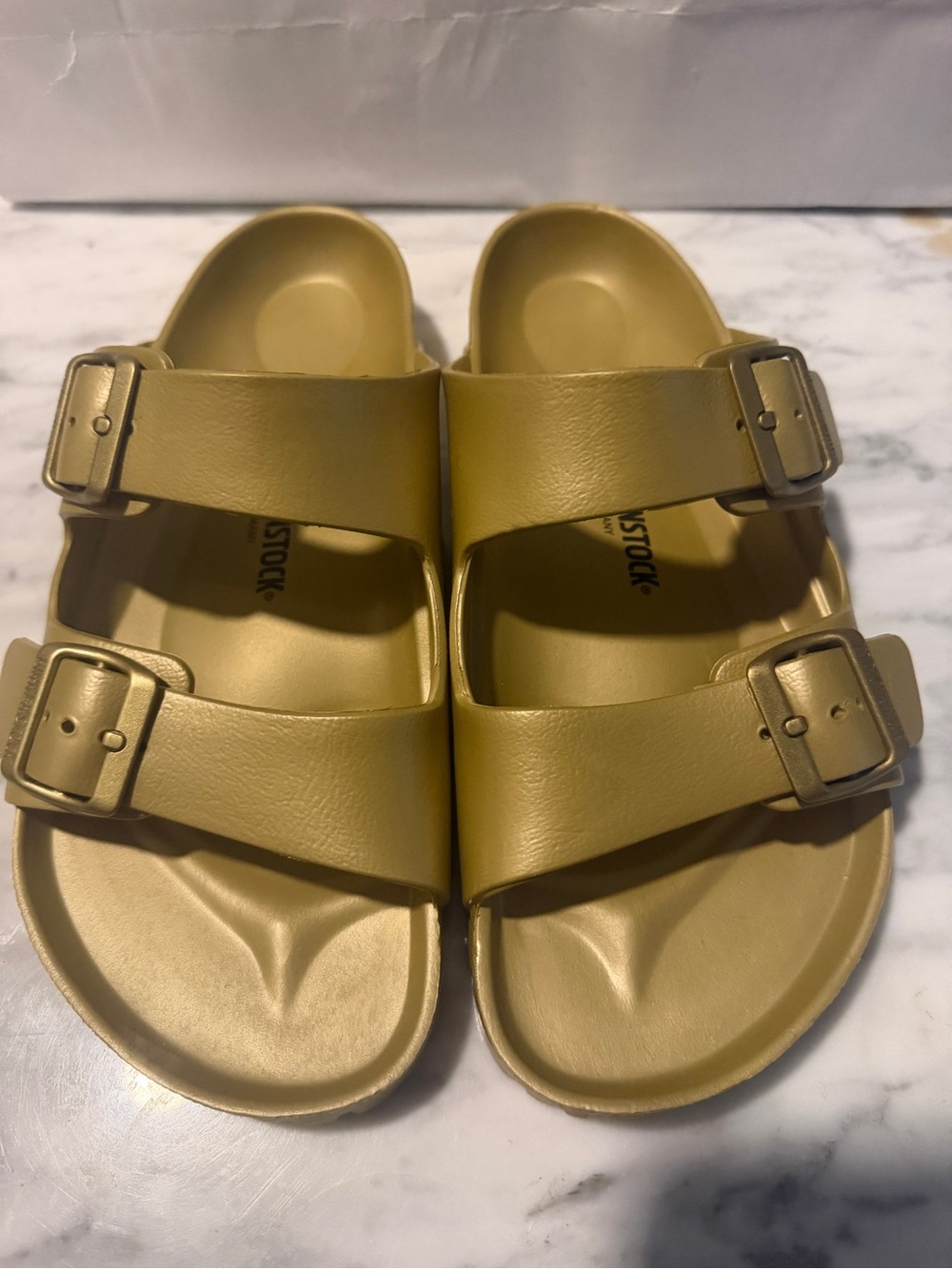 Birkenstock men’s Two-Strap Sandals in gold color